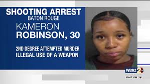 Woman accused of attempted murder of two in drive-by shooting arrested