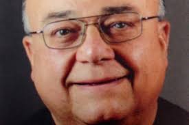 Mark Aita, physician and priest at N. Camden agency