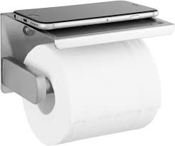 You can purchase a standard holder that mounts to a wall or cabinet or a freestanding type that holds your current roll, extra rolls, or both. Amazon Com Polarduck Brushed Nickel Toilet Paper Holder Self Adhesive Toilet Paper Roll Holder With Shelf Wall Mounted Without Drilling Polished Stainless Steel Kitchen Dining