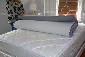 It has a mattress cover on it and a fitted sheet, but neither of those things stop it. Casper Mattress Topper Review