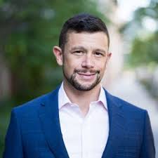 Tom Bauer, Real Estate Agent