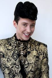 Internet Compares Johnny Weir S Olympic Closing Ceremony Hairstyle To Hunger Games Teen Vogue