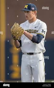 Michigan Wolverines pitcher Michael Hendrickson (30) looks to his catcher  for the sign against the Michigan State Spartans during the NCAA baseball  game on April 18, 2017 at Ray Fisher Stadium in