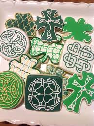 Saint patrick's day concept with green cookies shamrock on green background,. Irish Themed Cookies Cookie Decorating Sugar Cookie Cookies