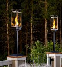 How many deck tiki torches do you need? Travis Industries Outdoor Torches Patio Lighting Authenteak