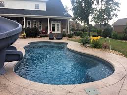 The Leisure Pools Eclipse In Graphite Grey Enjoy Your Life Of Leisure By Calling Us At 855 85 Splas Leisure Pools Travertine Pool Decking Travertine Pool