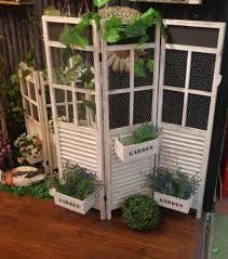 The tank glowed bright red and used to be a bit of landmark when the house was first built in the 1980's, you were never lost when you had the tank as a pointer. 20 Ideas To Hide The Oil Tank Garden Beautification Garden Plant Theatre Wooden Garden Gate