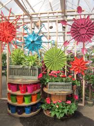 Beauty Blooms Flowers Constructed From Garden Tools Visual Merchandising Vm Retail Store Display Garden Garden Center Displays Floral Display Garden Tools