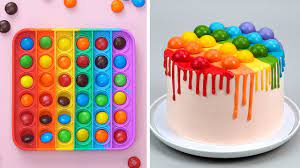 If you are a sweet tooth, you will definitely enjoy watching this video ;) i'm sure you will find a new dessert recipe that you will want to tr. Have Fun With Pop It Fidget Toys Tasty Plus Rainbow Cake Decorating Tutorials Cake It Up Youtube