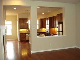 We had already opened up the kitchen wall to the dining room about 5 years ago, and then shortly after we had our kitchen cabinets painted white. Half Wall Design Open Kitchen And Living Room Half Walls Dining Room Remodel