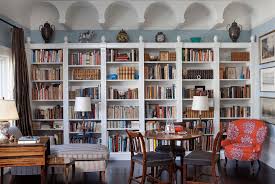 This traditional bookcase/wall unit was custom made for this space, with floor to ceiling storage. Beautiful Living Rooms With Built In Shelving