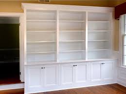 A custom bookcase for cookbook collection was built from recycled wood. Hand Made Home Office Built In Bookcases By Stuart Home Improvement Llc Custommade Com