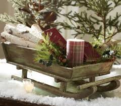 This rustic old chair provides a different platform for winter decorations, such as branches or pine cones. Make Your Own Wooden Vintage Sled Scavenger Chic