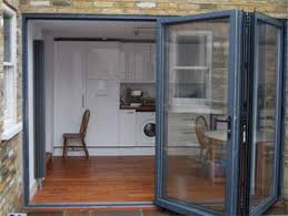 Each one slides into the wall pocket, for a seamless transition from indoors to. Accordion Style Folding Patio Glass Door Costs 2021 Benefits Prices Of Installing An Exterior Bifold Patio Door