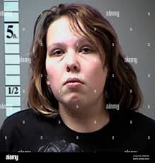 This undated photo provided by the St. Charles County Prosecuting  Attorney's Office shows Megan Hendricks, of Wentzville, Mo. Hendricks and  Robert Burnette, were arrested last week and charged with child abuse  causing