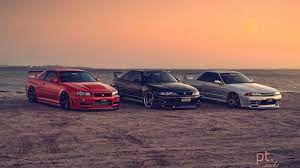 Wallpaper hd of nissan skyline gt r r34, nissan skyline gt r r33 skyline gt r r32, nissan skyline, nissan, japanese cars, jdm, red cars, purple cars, silver cars, beach, sunset, sand, car, vehicle. Nissan Skyline Gt R R34 Nissan Skyline Gt R R33 Nissan Skyline Gt R R32 Nissan Skyline Nissan Japanese Cars Jdm R In 2021 Nissan Skyline Skyline Gt Nissan Skyline Gt