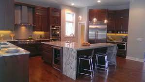 Walnut Kitchen Walnut Cabinets Fantasy Brown Quartzite Grohe Faucets Thermador Appliances Cb2 Vapor Bars Grey Kitchen Walls Walnut Kitchen Kitchen Remodel