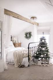 A Simple Cozy Bedroom Decorated For Christmas With A Vintage Winter Wonderland Theme In 2020 Winter Bedroom Christmas Decorations Bedroom Cozy Bedroom