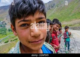 Bandipora, Jammu and Kashmir, India. 25th Sep, 2021. Children play near the  border fencing in Tulail, Gurez. Gurez lies along the LOC (Line of Control)  in northern part of Kashmir. The people in Gurez are the Dard-Shins with  their ancestry living in Gilgit in ...