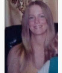 Remove baby from funeral portrait picture?