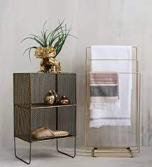 Double sink bathroom vanity cabinets are often mounted one above the other with space left for towels (and bottle traps) between. 9 On Trend Small Bathroom Storage Ideas Cb2 Idea Central