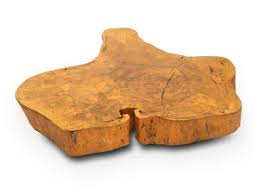 This striking wooden coffee table exudes a rugged charm that will make it a distinctive addition to your living room or bedroom. Contemporary Coffee Table Free Form Crosscut Rotsen Furniture Solid Wood Exotic Wood Custom