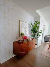 The tenant putting nails in the walls to hang decorations, or any items. Diy Accent Wall How To Apply Temporary Wallpaper In A Rental Apartment Katie S Bliss