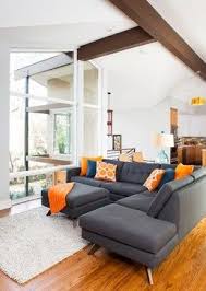 Druid Hills Mid Century Modern Midcentury Living Room Atlanta By Renewal Desi Living Room Orange Mid Century Living Room Orange Living Room Inspiration