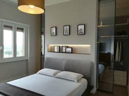 Cabina armadio sfrutta lo spazio dietro la testata del letto. Foto Camera Da Letto Con Cabina Armadio Di Federica Bossoni 765380 Habitissimo