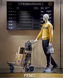 fendi tokyo japan i always like to arrive at the airport early to enjoy breakfast and lounge a suitcase display travel photos display window display design