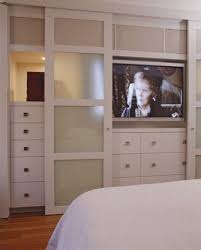 Bedroom furniture tv cabinet design ideas 2017 2018 pinterest via pinterest.com. Great Way To Hide The Tv Bedroom Wall Units Build A Closet Bedroom Design