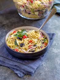 After it is mixed, pour the italian dressing mixture over top of the spaghetti and vegetables and mix it all together. Cold Spaghetti Salad Confetti And Bliss