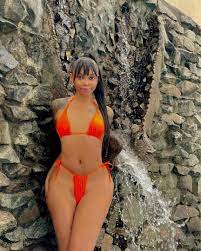Nigerian crossdresser Jay Boogie shows off his killer curves in sexy bikini  photos