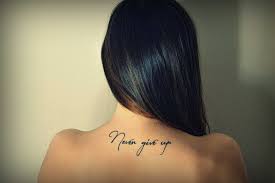 It's says never don't give up. Up Tattoos Tattoos Tattoo Never Give Up