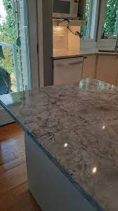 Technician is checking air conditioner ,measuring equipment for filling air conditioners. Granite Repair In Edmonton Ab 1 587 599 8077 M D Granite Repair