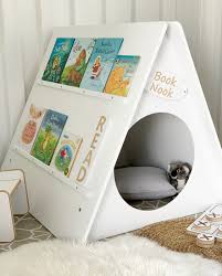 Most reading nooks are smaller and a bit closed off; Book Nook Kids Reading Station
