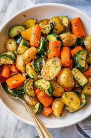 Add cooking oil and then garlic to heated oil. Garlic Herb Roasted Potatoes Recipe With Carrots And Zucchini Roasted Vegetables Recipe Eatwell101