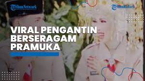Viral Pasangan Pengantin Mengenakan Seragam Pramuka di Hari Pernikahan,  Ternyata Ini Alasannya - Tribun Video