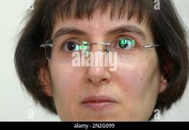 In this Feb. 6, 2015 picture women look at the painting "Nafea faa ipoipo?"  (1892) by French painter Paul Gauguin in the Fondation Beyeler in Riehen,  Switzerland. The Swiss owners of one