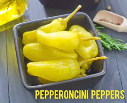 Compared to its doppelganger of a cousin the banana pepper, the pepperoncini is very close in overall spiciness. What S The Difference Pepperoncini Vs Banana Peppers Kitchensanity