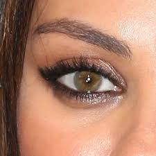 Apply a golden eyeshadow with an eyeshadow brush as the eyeshadow base. Exactly How To Line Your Eyes Like Mila Kunis Hazel Eye Makeup Hazel Eyes Wedding Makeup
