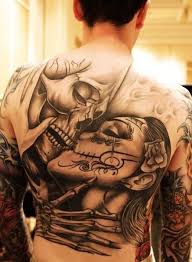 12 Awesome Back Tattoo Ideas Pretty Designs Gang Tattoos Gangster Tattoos Skull Tattoo Design
