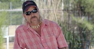 Tiger king, is the story of a man who has devoted his life to raising and breeding lions, tigers, and other exotic animals at his oklahoma zoo. Tiger King S Joe Exotic Accepts Carole Baskin S Offer To Reduce Prison Sentence