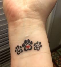 90 fantastic paw tattoo designs for pet lovers. The 80 Cutest Paw Print Tattoos Ever Page 2 The Paws Pawprint Tattoo Wrist Tattoos For Women Paw Tattoo