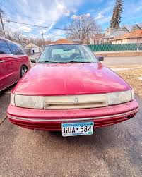 Image result for Light Beige 1990 Tracer