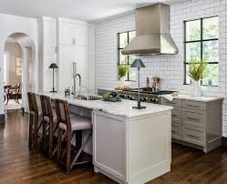 More and more, we're seeing kitchens with no upper cabinets (so just lower cabinets with either a full wall of tile/stone or just a short backsplash). Light Gray Kitchen With No Upper Cabinets Transitional Kitchen No Upper Cabinets Kitchen With No Upper Cabinets Kitchens Without Upper Cabinets