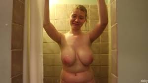 Blonde babe Irelynn Dunham swings her huge natural boobs after her shower
