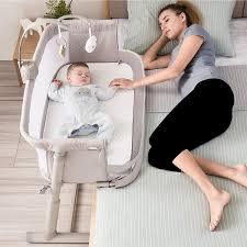 It means that travel cribs and many play yards can also be called mini cribs. Amazon Com Kidsclub Baby Bedside Sleeper With 2 Replaceable Sheets Baby Bedside Crib For New Born Standalone Side Sleeper For Infants Baby Nursery Bed 9 Height Adjustable For Bed Sofa Baby