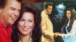 Conway and Loretta, reminiscing. ￼The greatest duo in music history! Don't  you just love it!