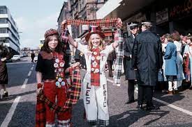 Les mckeown and stuart 'woody' wood and eric faulkner of the bay city rollers pose for a portrait backstage with a birthday cake given to faulkner by fans for his 22nd birthday on. Bay City Rollers Gear Bay City Rollers Bay City Roller